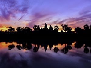 Preview wallpaper trees, reflection, silhouettes, pond, dark, evening, sky