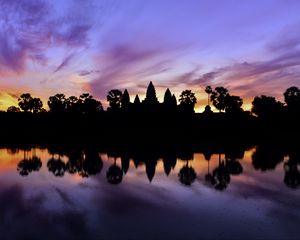 Preview wallpaper trees, reflection, silhouettes, pond, dark, evening, sky