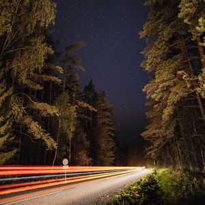 Preview wallpaper trees, road, lines, glow, stars, night