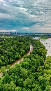 Preview wallpaper trees, road, water, city