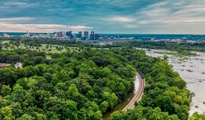 Preview wallpaper trees, road, water, city