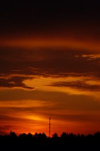 Preview wallpaper trees, silhouette, shadows, clouds, sunset, dark, landscape