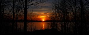 Preview wallpaper trees, silhouettes, lake, sun, sunset, dark
