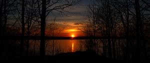 Preview wallpaper trees, silhouettes, lake, sun, sunset, dark