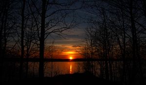 Preview wallpaper trees, silhouettes, lake, sun, sunset, dark