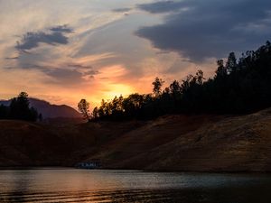 Preview wallpaper trees, silhouettes, lake, sunset, landscape, dark