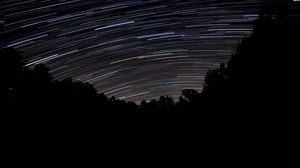 Preview wallpaper trees, silhouettes, stars, long exposure, dark