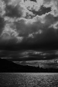 Preview wallpaper trees, silhouettes, water, clouds, glare, bw, black and white