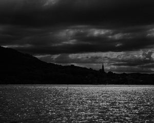 Preview wallpaper trees, silhouettes, water, clouds, glare, bw, black and white