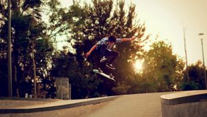 Preview wallpaper trees, skateboard, boy, skate, street
