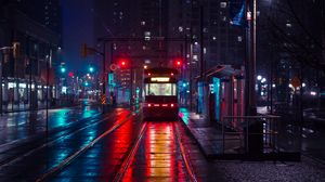 Preview wallpaper trolley, stop, city, evening, lighting