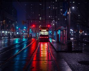 Preview wallpaper trolley, stop, city, evening, lighting