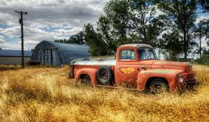 Preview wallpaper truck, garage, field, farming, column, wires, clearly