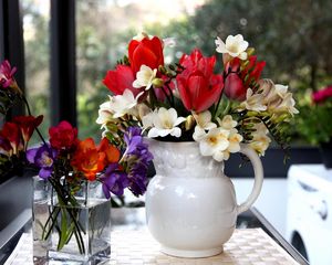 Preview wallpaper tulips, freesia, flowers, glass, jar, beauty