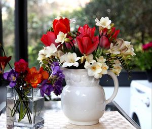 Preview wallpaper tulips, freesia, flowers, glass, jar, beauty