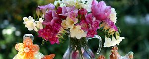 Preview wallpaper tulips, freesia, flowers, bouquet, jar, figurines, ornaments