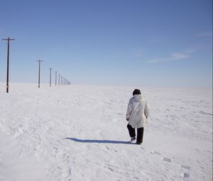 Preview wallpaper tundra, people, snow, footprints