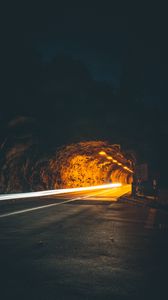Preview wallpaper tunnel, backlight, movement, dark, rock, long exposure, road, night