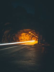 Preview wallpaper tunnel, backlight, movement, dark, rock, long exposure, road, night