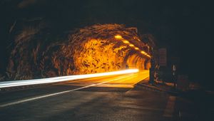 Preview wallpaper tunnel, backlight, movement, dark, rock, long exposure, road, night