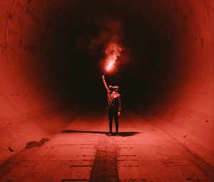 Preview wallpaper tunnel, man, gas mask, light, fire, red