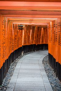 Preview wallpaper tunnel, path, hieroglyphs, wooden