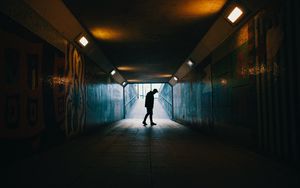 Preview wallpaper tunnel, silhouette, underground, dark, loneliness