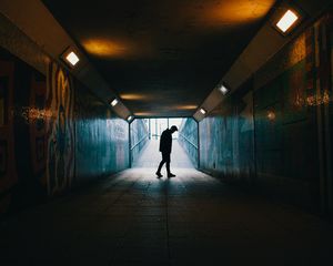 Preview wallpaper tunnel, silhouette, underground, dark, loneliness