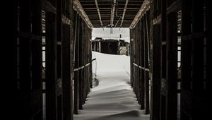 Preview wallpaper tunnel, snow, dark, wooden, snowdrifts