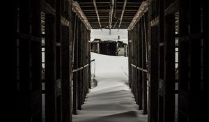 Preview wallpaper tunnel, snow, dark, wooden, snowdrifts