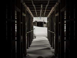 Preview wallpaper tunnel, snow, dark, wooden, snowdrifts