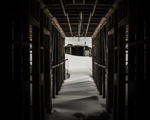 Preview wallpaper tunnel, snow, dark, wooden, snowdrifts