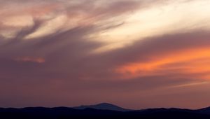 Preview wallpaper twilight, sky, clouds, mountains, silhouettes