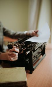 Preview wallpaper typewriter, paper, hands, retro