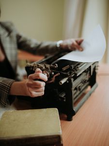Preview wallpaper typewriter, paper, hands, retro