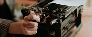 Preview wallpaper typewriter, paper, hands, retro