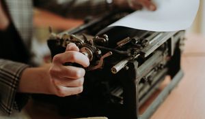 Preview wallpaper typewriter, paper, hands, retro