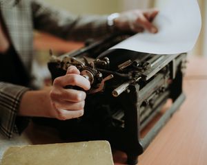 Preview wallpaper typewriter, paper, hands, retro