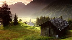 Preview wallpaper tyrol, austria, misty, mountain, village