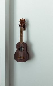 Preview wallpaper ukulele, musical instrument, strings, wall