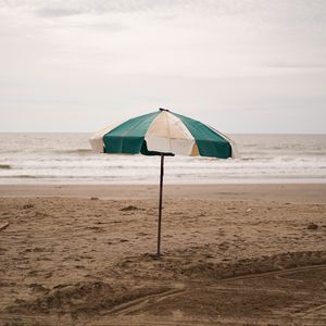 Preview wallpaper umbrella, beach, sea, sand