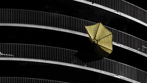 Preview wallpaper umbrella, building, facade, wind