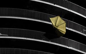 Preview wallpaper umbrella, building, facade, wind
