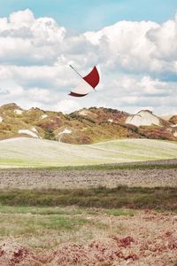 Preview wallpaper umbrella, hills, grass, field