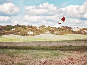 Preview wallpaper umbrella, hills, grass, field