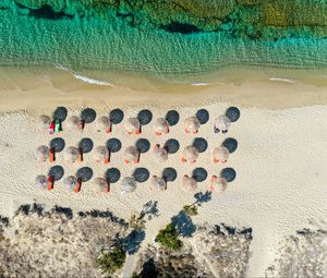 Preview wallpaper umbrellas, beach, aerial view, sea