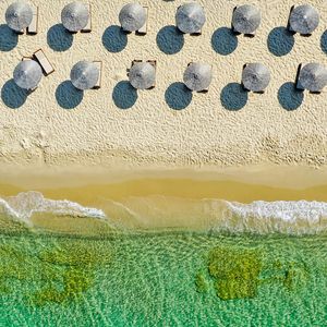 Preview wallpaper umbrellas, beach, aerial view, sea, coast