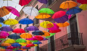 Preview wallpaper umbrellas, building, colorful, balcony