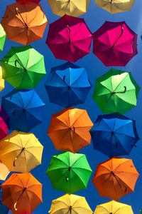 Preview wallpaper umbrellas, colorful, sky, sunny