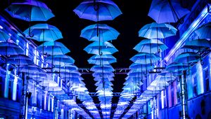 Preview wallpaper umbrellas, scenery, street, illumination, lights